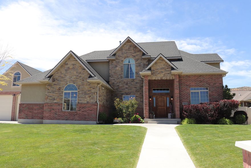 Step into this elegant but practical home located in Hidden Hollow.  This home and property is in immaculate condition and ready for you to move in!  So many features in this 5 bedroom home located in the desired Hidden Hollow Neighborhood. Private office area for your work at home, custom kitchen with granite and large bedrooms.  The basement features multiple rooms including large walk-in pantry and  a large theatre room with fully reclined seating for 9+.  Included are projector with screen and insane sound system and theatre lighting.  There is a game room with wet bar, sink, mini fridge, popcorn maker and ice machine to complete your theatre experience.  Step out on to the covered patio and enjoy the epoxy that makes cleaning a breeze.  This area includes a built in BBQ/burner/cold storage/trash and an updated granite kitchen island.  Outside features include an attached 2 car garage with epoxy floors and heat.  Large detached shop with heat,  50 amp plug and a huge storage area above which is fully painted.  Additional outside features include raised flower beds and mature fruit trees which have a plentiful yield.  There are Peach, plum and apple trees with raspberries also.  10x10 garden area , huge sand area (40x23) and plenty of RV/side by side parking.  This is definitely a must see for the qualified buyer.