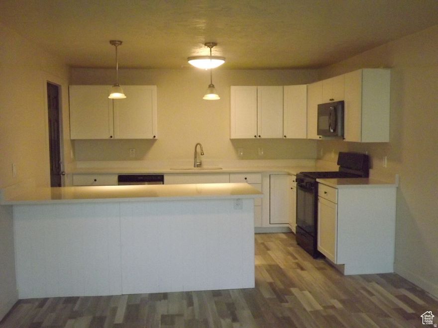 AMAZING NEWLY REMODELED HOME. 3 bedrooms, 2 bathroom located on 1 acre in a great area. Kitchen has beautiful granite counter tops and all new appliances. Family room in basement can be used as a 4th bedroom. This home has brand new wiring, plumbing and a new water line to the house. Water rights availability would need to go thru Lyn Irrigation. Behind the house has the peaceful setting of the country with a babbling brook. You can build a huge shop & ADU.  There is plenty of room on this lot to park cars, RV's & recreational vehicles and still have enough room for a yard. MUST SEE TO APPRECIATE, BRING AN OFFER.