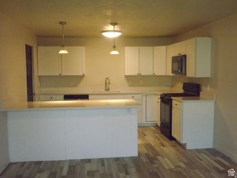 Photo of 197 2ND ST W, Ogden, UT 84404 (MLS # 2129917)