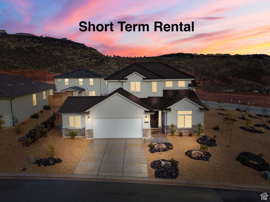 Fully furnished and rental-ready, this profitable vacation home is the ultimate hassle-free investment or personal getaway. Featuring 4 bedrooms, 3 full bathrooms, and a dedicated bunk room with 3 bunk beds, it's designed to comfortably host large groups and families.  Guests will love the private hot tub, fire pit, ping pong table, and TVs in every bedroom-all included in the sale.  Located in a resort-style community with top-tier amenities: a heated pool with a giant slide, a relaxing lazy river, and 2 pickleball courts for endless entertainment.  Just minutes from Sand Hollow, world-class golf courses, and Zion National Park, this home offers the perfect balance of adventure and relaxation.  With stylish finishes and a proven track record as an income-producing rental, it's fully prepped to start earning-or to serve as your dream vacation home-from day one.