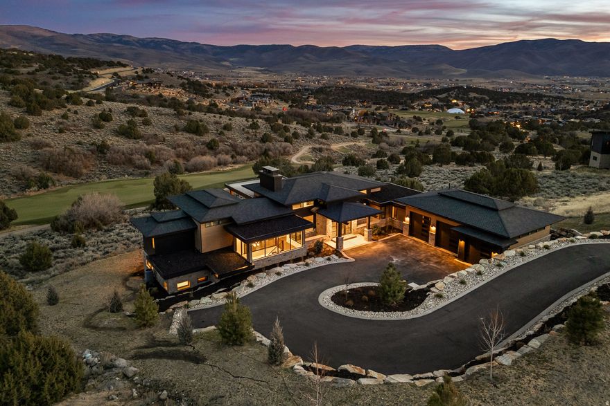 A Red Ledges full Golf membership is available with this stunning mountain modern home under construction in Red Ledges that will be a masterpiece of contemporary design and natural beauty. Nestled amidst the rugged landscapes of Utah's mountains, this property combines sleek, modern architecture with rustic elements, creating a harmonious retreat. The exterior showcases a blend of stone, wood, and expansive glass, designed to complement the surrounding scenery. Inside, an open floor plan maximizes space and light, with high ceilings, exposed beams, and large windows framing breathtaking views. The kitchen features top-of-the-line appliances and custom cabinetry, perfect for entertaining. Luxurious finishes include natural wood flooring, stone accents, and spa-like bathrooms with modern fixtures. Outdoor living spaces abound, with a spacious deck and patio with multiple fire pits, ideal for enjoying the mountain air and views of the Jack Nicklaus Signature golf course. Offering the best of mountain living and modern amenities, this home promises a lifestyle of luxury and tranquility. Don't miss the opportunity to make this exceptional property your own. Contact us today for details on potential customization and timing.
