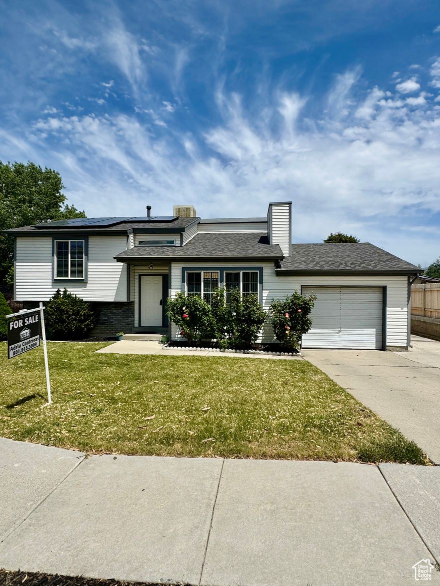 Price reduction!  Welcome to a beautifully 5-bedroom, 2-bath gem in the heart of West Jordan; perfect for larger households. Amazing deck to enjoy gatherings . This spacious home features a modernized exterior with upgraded siding and a newer roof (both approx. 5 years old, water heater and furnace about 4 yrs old), giving you peace of mind for years to come. Fully paid-off solar panels mean lower utility bills and energy independence from day one. Inside, you'll find a freshly painted interior that radiates warmth.  Located in a well-established neighborhood with easy access to schools, shopping, parks and commuter routes. This is more than a home, it's a smart investment in lifestyle and long-term value. Spacious laundry room..Show with confidence!  Square footage figures are provided as a courtesy estimate only and were obtained from county records.  Buyer is advised to obtain an independent measurement.