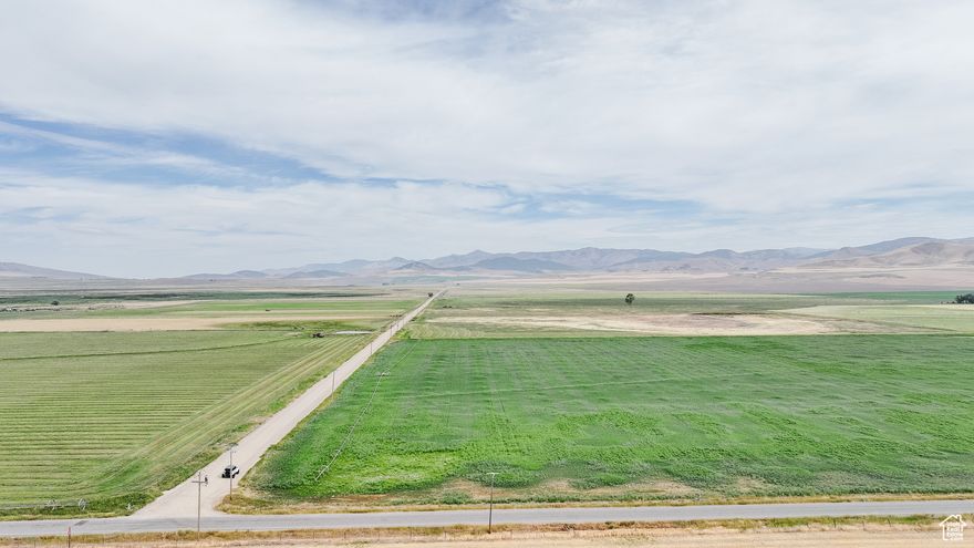 Motivated seller.  Water right #13-2247 1.73 cfs for 520 acres was added to the listing. This can be sold separately. Looking to get a functional diversified farming operation or add to your operation. This is great farm ground, 405 +/-  irrigated acres  are flat and don't require as much water as most properties to produce 6 tons per acre. There are 3 new Valley cell ready pivots,  5 wheel lines and a new 125 horse pump. The system is sized and planned and there is enough water for two more pivots. This acreage is planted in alfalfa and wheat. (plus a water right and well for 520 additional acres) there is another 945 +/- acres of the quality dry farm. Twin Lakes Canal runs through this property. This property sits on both sides of 1200 W and Mail Rout Road. Battle Creek runs through this property.  Multiple tax ID numbers. See the virtual tour for an interactive map of the property.