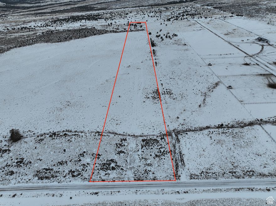 Set against Utah's wide-open skies, this 13.73-acre property in Cedar Fort offers the rare freedom to build, grow, and live your way. Zoned RA-5 and equipped with its own well and water rights, it's ideal for a custom home, horses, or a working homestead. Expansive views and peaceful surroundings create a quiet escape-just far enough from the city to feel like a retreat, yet close enough for convenience. If you're looking for space, self-reliance, and a property with true potential, this is where your next chapter begins.