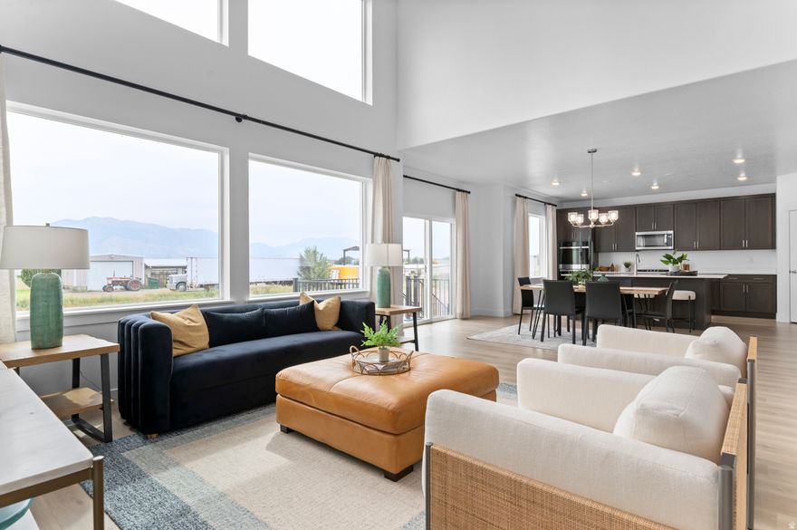 Currently framing with est completion of Feb 2026. The Harmony plan, same as the model home, sits on a .25 acre lot with incredible mountain views that offers a perfect blend of comfort and style. It has soaring floor to ceiling windows to showcase breathtaking views from the open concept family/dining/kitchen. This 4 bedroom home has the Primary Suite-on-the-Main, with hook up for W/D in the walk-in closet. The kitchen is equipped with double ovens, a sleek gas range cooktop, and a large oversized island, ideal for extra work space or counter seating. There is also a home office with double glass French doors. Upstairs are three spacious bedrooms, full bathroom and laundry room. The separate basement entrance is perfect for an ADU! Ask me about our Generous Home Warranties, Active Radon Mitigation System, and Smart Home Package which are all included. *No representation or warranties are made regarding school districts and assignments; conduct your own investigation regarding current/future school boundaries. Photos may or may not be of actual home. Buyers to verify colors, materials, and options. Square footage figures are provided as a courtesy estimate only and were obtained from building plans. ***Sales Center Hours: Open Monday, Tuesday, Thursday, Friday, and Saturday from 10:00 a.m. - 5:00 p.m. Wednesday from 1:00 p.m. - 5:00 p.m. Closed Sundays. Call for an appointment!