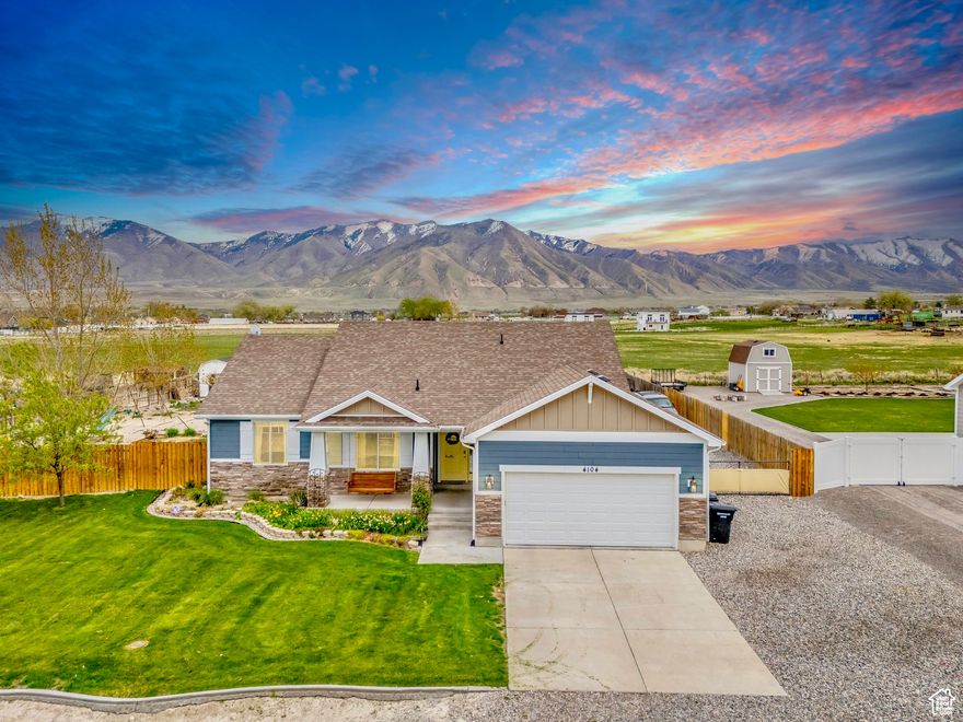 $25,000 PRICE REDUCTION!!!    SELLER is also OFFERING $6,000 toward CLOSING COSTS when you use our preferred lender. ***.***.  HORSE PROPERTY with 5 Bedrooms, 3 Bathrooms, an Office Room, 3-Car Garage, RV Parking, and NO BACKYARD NEIGHBOR!!!   Enjoy magnificent MOUNTAIN and SUNSET VIEWS from this beautifully UPGRADED HOME!  Upgrades include NEW FLOORING in all bedrooms, a NEW WATER HEATER, 6-INCH INSULATED EXTERIOR WALLS, UPGRADED STAIRS, MOTION LIGHTS on the main level, Wi-Fi Integrated Irrigation, FIBER Internet options, and more!  The Great Room offers an OPEN FLOOR PLAN with stunning mountain views.  The beautiful Primary Bedroom features a private Ensuite.  The BONUS OFFICE ROOM is perfect for working from home.  The huge Family Room downstairs is ideal for a HOME THEATER or hosting fun GAME NIGHTS with friends and family.  Sitting on a 0.55-ACRE LOT, this property is zoned for animals, making it perfect for your horses or other livestock.  There's plenty of space for all your cars and toys with an attached 2-car garage, detached 1-car garage, and RV parking.  LOCATION is unbeatable! Nestled in a quiet, family-friendly neighborhood, yet just 10 minutes to restaurants and grocery stores and less than 30 minutes to Salt Lake City. The new, state-of-the-art Desert Peak High School nearby is a huge plus!   This is the home you've been looking for - come see it today!  Information and measurements are provided as a courtesy. Buyer is advised to obtain their own measurements and verify all information.