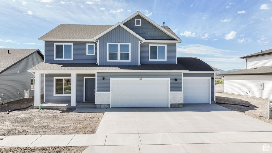 This home has so many amazing features, it is hard to list them all. The main floor is equipped with an office/bonus room, a mudroom, half bathroom, storage under the stairs, an open living and dining space, and a dream kitchen with a huge walk-in pantry hidden behind cabinets! Upstairs you'll find 4 large bedrooms, 2.5 bathrooms, and an oversized laundry room. The owner's suite is equipped with a giant double-sided walk-through closet, separate tub and shower, dual vanities, and a toilet room. Other features include a spacious 3 car garage, a perfect 0.31 acre lot, and the abundance of windows that allow natural light and amazing views all around! Nibley City is planning on building a park directly across the street and you'll have no neighbors behind you. This is a fantastic home, and we will even give you $8,000 towards closing costs! Schedule a showing today!