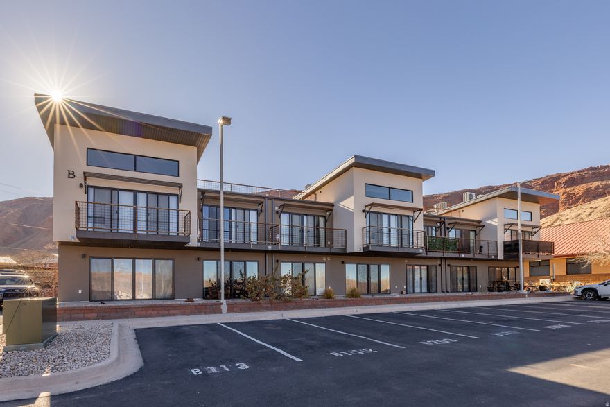 Kane Creek Blvd condo  Built 2022  Studio layout  In unit laundry  Forced air heating and cooling  Assigned parking  Personal outdoor patio  Shared rooftop patio  Minutes to downtown Moab  Built in 2022, this studio condominium on Kane Creek Blvd offers an efficient layout and a convenient location close to the town of Moab. The approximately 500 sq ft interior includes a full kitchen, forced air heating and cooling, and in unit laundry for everyday ease. A personal outdoor patio extends the living space, while a shared rooftop patio provides an additional place to relax or enjoy the surroundings. Assigned parking is included.  443 Kane Creek Blvd Unit B 112 is positioned near dining, shops, and local services, with easy access to Highway 191 and nearby recreation areas and trails. The HOA covers insurance, exterior maintenance, sewer, water, trash, and snow removal, and enforces established pet rules with pets permitted. Furnishings are optional, offering flexibility for move in or personalization.