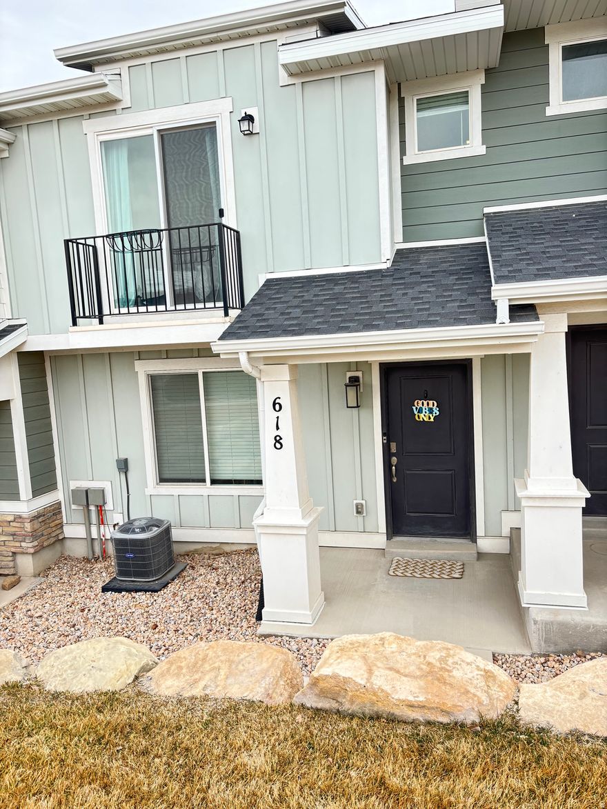 Like-new townhome in the desirable Cold Spring Ranch community in Lehi. Designed with modern living in mind, this home features a bright and spacious open-concept great room. Includes 3 bedrooms, including a master suite complete with a walk-in closet and built-in shelving. Also includes 2 full bathrooms and a 2-car garage. 5 foot tall crawl space allows for lots of extra storage. All major appliances are included, featuring a like-new refrigerator and high-efficiency washer and dryer (purchased in 2022), making this home truly move-in ready. Located on a quiet street with a landscaped grassy area out front and open views across from a church building...Enjoy walking-distance access to exceptional community amenities, including: pool, sport courts, pickleball courts, BMX dirt track, and playgrounds. Plus, you're just steps from the scenic Jordan River Trail, perfect for biking, jogging, or peaceful evening walks. This is low-maintenance living in one of Lehi's most vibrant and amenity-rich communities.