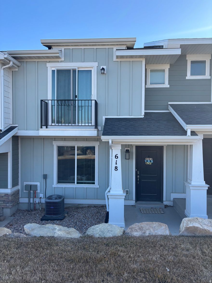 Like-new townhome in the desirable Cold Spring Ranch community in Lehi. Designed with modern living in mind, this home features a bright and spacious open-concept great room. Includes 3 bedrooms, including a master suite complete with a walk-in closet and built-in shelving. Also includes 2 full bathrooms and a 2-car garage. 5 foot tall crawl space allows for lots of extra storage. All major appliances are included, featuring a like-new refrigerator and high-efficiency washer and dryer (purchased in 2022), making this home truly move-in ready. Located on a quiet street with a landscaped grassy area out front and open views across from a church building...Enjoy walking-distance access to exceptional community amenities, including: pool, sport courts, pickleball courts, BMX dirt track, and playgrounds. Plus, you're just steps from the scenic Jordan River Trail, perfect for biking, jogging, or peaceful evening walks. This is low-maintenance living in one of Lehi's most vibrant and amenity-rich communities.