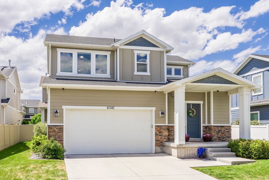 This two-story home sits right in the middle of Herriman Town Center, one of the most walkable spots on the southwest side of the valley. It's fully finished top to bottom, so there's real space to live, host, and grow into. Fresh new carpet runs throughout the home, and the kitchen has been updated with painted cabinets and a tile backsplash that adds character without going overboard. Upstairs, the primary suite overlooks the mountains and includes a walk-in closet and an ensuite bath. One of the secondary bedrooms also has its own walk-in closet - handy for kids, guests, or a home office. The location is what people move to Herriman for. You can walk to local shops, restaurants, and cafs, and Mountain View Village is just minutes away for bigger shopping trips. Mountain View Corridor is right there too, which makes the commute north toward Salt Lake City or south to Lehi about as easy as it gets in this part of the valley. Priced to move and showing beautifully - at this number, in this location, it won't be on the market long. Schedule your showing before someone else beats you to it.