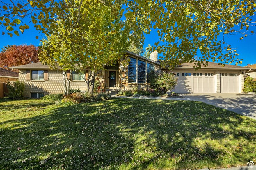 Beautiful Millcreek Rambler in a Prime Location! This spacious 6-bedroom, 3.5-bath home offers comfortable main-floor living with a primary suite, two kitchens, ample storage, and dual laundry hookups. Bright, open spaces are perfect for gathering and entertaining, complemented by a 3-car garage for all your needs. Ideally located near schools and scenic canyon access-an ideal place to call home!