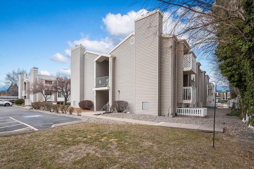 Photo of 875 E ARROWHEAD LN S #47, Murray, UT 84107 (MLS # 2186434)