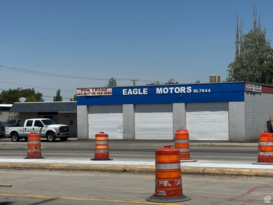 GREAT CORNER LOCATION!  This property is located on the corner of 1100 South 500 West.  Great area for traffic to easily pull into the property or view the property while waiting for the traffic light.  Currently the building is rented out to a car dealership at $4,000 (Triple Net Lease) with 2 years left on the lease.  This business also has 12 storage units behind it as an added bonus!   Almost all storage units are rented out on a month to month basis and average approximately $150 per unit!   This property has generally been rented out to Car Dealerships as the Utah Auto Auction is just minutes down the road and the building is on a great corner across from a 7-11 store.   It has also been used as an Auto Body/Repair shop in the past as well.  A great location and set up for a Jiffy Lube type of business as well.  Sky is the limit!  *NOTE:  Owner does not want the current tenant bothered so property will only be shown with an accepted offer.  Accepted offer will be subject to Buyer touring the property as well as any inspections Buyer wants to do during the due diligence.  So there is no risk putting an offer in!   Listing agent is related to Seller.   Square footage figures are provided as a courtesy estimate only and were obtained from Seller Self-measurement .  Buyer is advised to obtain an independent measurement.