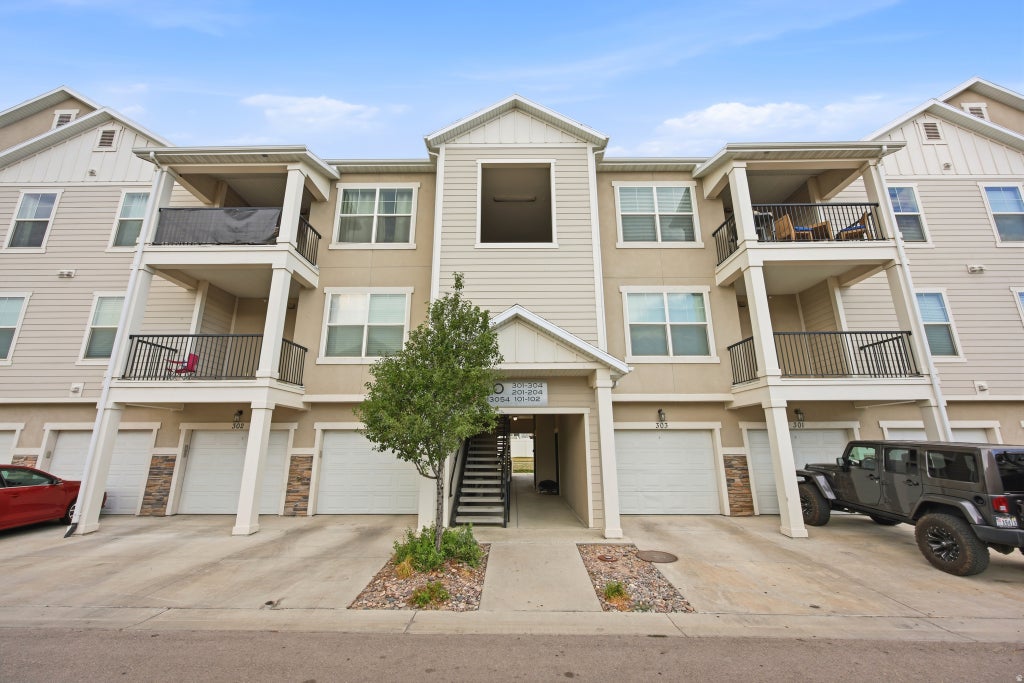 Photo of 13054 S TORTOLA DR W #301, Herriman, UT 84096 (MLS # 2175097)
