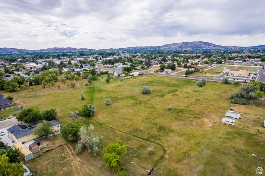 Great building potential with this parcel.The R-3 zoning in Uintah County, Utah is a residential zone for multi-family dwellings, but it also allows for some commercial uses. It's a transitional zone between commercial and residential areas. Currently there are no utilities connect to the property. Utilities are easily accessible. Buyer to verify any and all information.