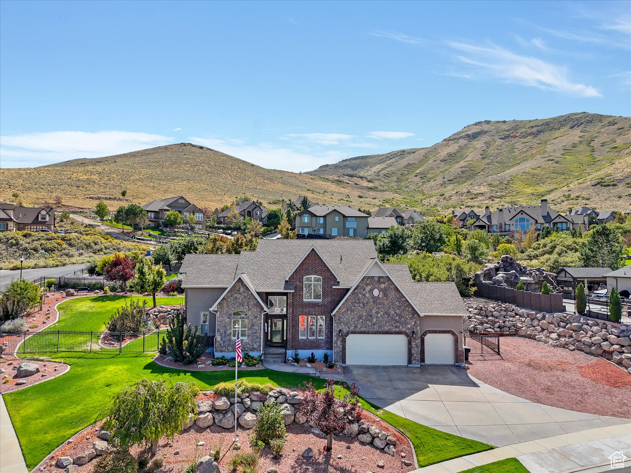 Welcome to your dream home in the heart of Herriman! Nestled on a beautifully landscaped -acre lot, this meticulously maintained property offers a rare blend of energy efficiency, smart upgrades, and comfort - inside and out. Key Features & Upgrades: Energy Efficiency at Its Finest- Equipped with solar panels and battery backup (2022), solar fans, and a full attic solar blanket (2021) - enjoy low utility bills and peace of mind during outages. Updated HVAC & Air Quality Systems- The new HVAC system (installed in 2021) and a whole-home water filtration and softener system (installed in 2023) ensure year-round comfort and clean air/water. Modernized Appliances- Enjoy a new refrigerator, dishwasher, and garbage disposal (2024) - all energy-efficient and ready for everyday convenience. Beautiful New Windows- Large new windows in the living room, dining room, and kitchen (2024) flood the home with natural light while enhancing the views of the home's beautiful backyard. Garage Upgrades- Brand-new garage doors and openers (2024) for smooth operation and enhanced exterior style. The oversized RV parking also features a 50-amp outlet to meet all your recreational needs. Storage Abundance- Walk-in closets in every bedroom, a massive cold/shelved storage room in the basement, and a shed on-site. You'll have no problem storing all your personal items! Interior Highlights: Recreational Basement- Includes a spacious living room, 3/4 bathroom, theatre set up, pool table, storage areas, and a workout room - perfect for guests, hobbies, or a private retreat. Whole-Home Central Vacuum System for easy cleaning throughout the house. Elegant Plantation Shutters throughout the home provide timeless style and privacy. Outdoor Oasis- Fully landscaped backyard with exquisite water feature - ideal for entertaining or relaxing with family. Covered patio with included hot tub for year-round enjoyment. Spacious yard offers room to play, garden, and grow! This home truly has it all - efficiency, elegance, space, and smart upgrades - in a quiet, desirable Herriman neighborhood. Don't miss your chance to make this unique gem your forever home. Square footage figures are provided as a courtesy estimate only and were obtained from assessor records. Buyer is advised to obtain an independent measurement.