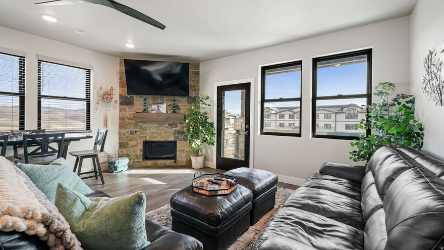 Discover effortless mountain living in this thoughtfully designed 3-bedroom, 2-bath single-level condo at Mayflower Lakeside-one of the newest luxury communities perfectly positioned between Deer Valley East Village and Jordanelle Reservoir. This residence blends comfort, style, and true low-maintenance living, making it an ideal retreat or investment. Step inside to an open-concept layout enhanced by 9-foot ceilings and expansive windows that bathe the space in natural light. A cozy gas fireplace offers a warm, inviting atmosphere after a day on the slopes or the water. The contemporary kitchen impresses with quartz countertops, large island and Viking appliances. Enjoy morning sun and mountain views from your south-facing balcony, accessible from both the living area and the primary suite. Building conveniences include underground parking with storage, elevator access, and a soon-to-be-finished clubhouse featuring a seasonal pool, year-round hot tub, pickleball courts, and a play area-perfect for family, guests, or short-term renters. The location is unbeatable: just 5 minutes to DVEV's chairlifts and Jordanelle Reservoir, 15 minutes to Park City or quaint Midway and under 40 minutes to SLC Intl Airport. Whether you're seeking a personal mountain getaway or a smart income-producing property, Mayflower Lakeside delivers modern comfort, unbeatable access to outdoor adventure, and the simplicity of lock-and-leave living.