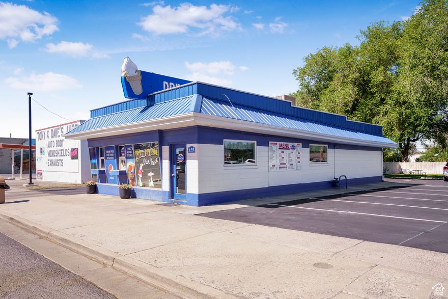 Don't miss your chance to own a profitable drive-in on bustling Beavers Main Street! This thriving establishment offers a fully updated building equipped with top-of-the-line fixtures, including three high-capacity ice cream machines and a brand-new grill-perfect for serving your customers quickly and efficiently. Enjoy convenient paved parking and accessible drive/walk-up windows for customer ease. The inviting dining area, outdoor tables, and ample storage container make it easy to accommodate guests year-round. With restrooms and prime Main Street frontage, this location is primed for visibility and success.