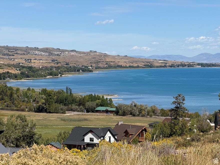 The most amazing view of Bear Lake and the mountains from this lot! Gated community!  Not far from Bear Lake State Park Marina! Enjoy the view of the beautiful Fall leaves along with the incredible lake view!  Close to Garden City shops and restaurants!