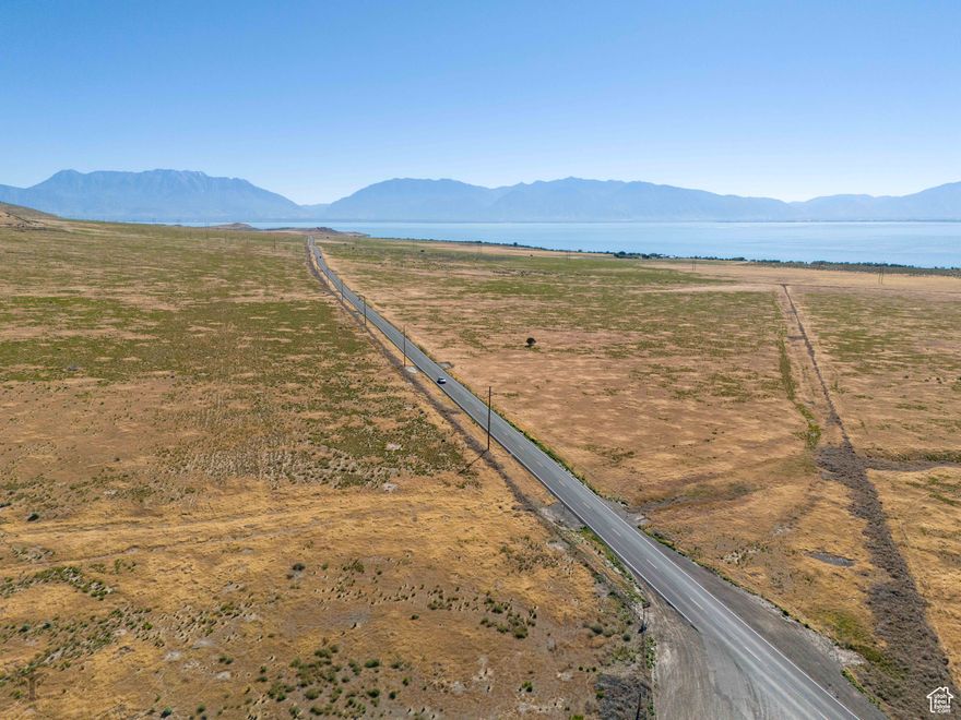 Gorgeous lake and mountain views, just 10 miles south of Saratoga Springs lies this 70 acre parcel. Highway 68/Redwood Road runs right through it, boasting an incredible 1600  feet of road frontage on the west side and 1700 feet on the east side of HWY 68! With the gradual slope, the lake is within view on almost every part of the property.  The southwest corner of the two parcels is the easiest to find. It is near the Soldier's Pass connection on HWY 68.  There is a well located on the property, but it has not been used in the 22 years the seller has owned the property, nor does the seller possess water or mineral rights. The well may need to be drilled again, but water should be very easy to find.