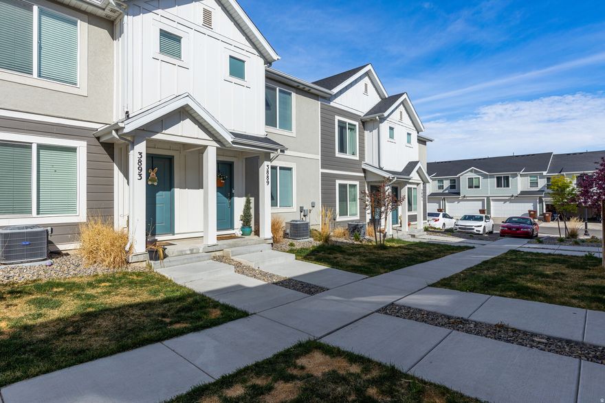 *** $10,000 PRICE ADJUSTMENT! This is by far the best deal in the community. The price with the stylish updates CAN'T BE BEAT!  This stylish, nearly-new 3-bedroom townhome in the Foothills of the Oquirrh Mountains. Built in 2023, this home shows like new and is loaded with stylish updates. The 3 spacious bedrooms, 2 full bathrooms, and a layout that is open, functional, and great for everyday living or entertaining.  The kitchen features a gas range, quartz countertops, and stainless steel appliances-exactly what buyers are looking for right now.  The community brings a ton of value too, with a pool, clubhouse, playground, and pickleball courts-making it easy to enjoy where you live.  Tucked up against the Oquirrh Mountains, you'll have great views while still being close to schools, shopping, and quick freeway access.  As a bonus, a radon mitigation system is already installed.  Clean, updated, and move-in ready-this is one you don't want to miss.