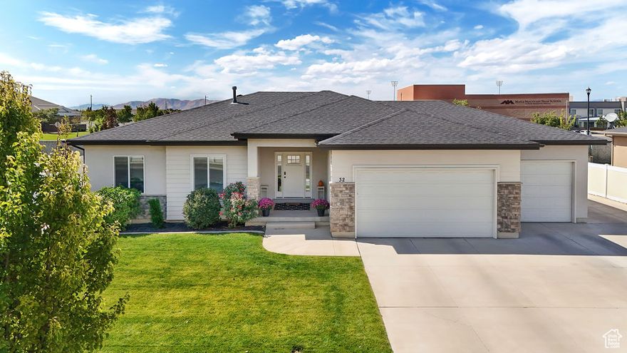 This 5-bedroom, 3-bath home offers 3,601 sq ft on a 0.26-acre lot with an open and bright layout. Inside, you'll find real white oak hardwood floors and plenty of natural light.   The home is move-in ready with a low-maintenance backyard, RV parking, a deep 3rd-car garage, and a spacious driveway.  Located next to Maple Mountain High School, this home also has easy access to shopping, parks, and the freeway. Electric Park is just around the corner with pickleball courts, a playground, basketball court, and walking paths.  Enjoy a peaceful neighborhood setting along with great views of Maple Mountain.