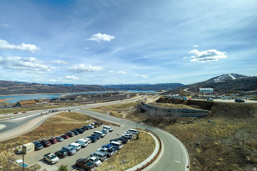 Turnkey Top-Floor Studio with Lake & Mountain Views  Like-new studio condo offering unobstructed views of Jordanelle Reservoir and surrounding ski terrain. This property is ideal for personal use or as a strong rental opportunity.   Owners and guests enjoy access to a variety of amenities including a fitness center, lounge areas, hot tub, steam room, ski and bike storage, and more. Conveniently located near the Deer Valley East Village gondola, with quick access to world-class skiing in the winter and hiking, biking, and Jordanelle Reservoir recreation in the summer.  Just 50 minutes from Salt Lake City International Airport and a short drive to Park City's resorts, dining, shopping, and entertainment.