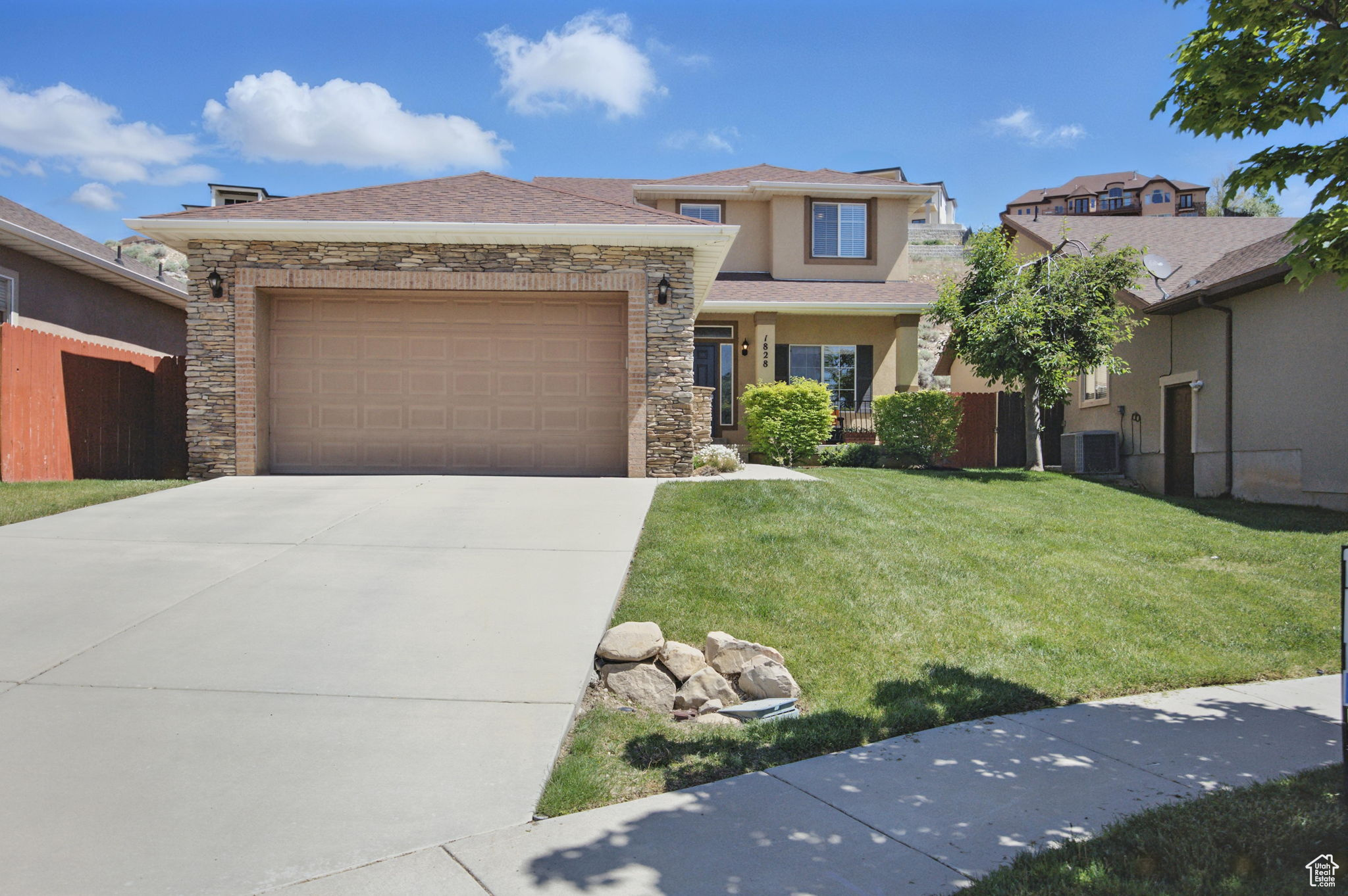 Tucked away on a quiet cul-de-sac, this beautiful two-story home offers incredible views and unbeatable convenience-just a short walk to Adobe, Cabela's, and the Traverse Mountain Factory Outlets. The open floor plan features 9' ceilings and a spacious great room, perfect for entertaining or cozy nights in. The kitchen shines with granite countertops and a raised island for casual dining. Upstairs, the large master suite is your personal retreat with a separate tub and shower. The unfinished basement offers room to grow with space for a second family room and additional bedrooms. Outside, enjoy a private dog run and easy freeway access for stress-free commuting. Don't miss this one!