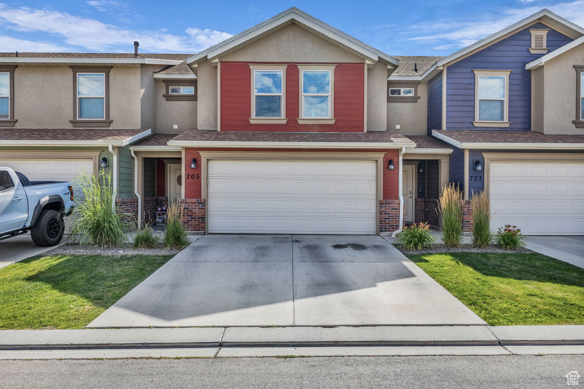 Welcome to your new home in the heart of Spanish Fork! This beautifully maintained three bedroom, three bath townhome offers a bright, open layout perfect for both relaxing and entertaining. Enjoy stylish quartz countertops, stainless steel appliances, and a clean feel throughout. The spacious primary suite features a large walk-in closet and a private bathroom; your own personal retreat. Downstairs, the oversized two-car garage with epoxy flooring includes a built-in workbench, ideal for hobbies or extra storage. Located across from the incredible Spanish Fork Sports Park, you'll have softball fields, pickleball and tennis courts, playgrounds, and scenic walking trails just steps from your front door. And with quick freeway access just 5 minutes away, commuting is a breeze. Don't miss your chance to live in this peaceful, well-kept community!