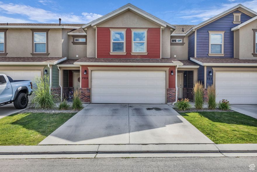 Welcome to your new home in the heart of Spanish Fork! This beautifully maintained three bedroom, three bath townhome offers a bright, open layout perfect for both relaxing and entertaining. Enjoy stylish quartz countertops, stainless steel appliances, and a clean feel throughout.  The spacious primary suite features a large walk-in closet and a private bathroom; your own personal retreat. Downstairs, the oversized two-car garage with epoxy flooring includes a built-in workbench, ideal for hobbies or extra storage.  Located across from the incredible Spanish Fork Sports Park, you'll have softball fields, pickleball and tennis courts, playgrounds, and scenic walking trails just steps from your front door. And with quick freeway access just 5 minutes away, commuting is a breeze.  Don't miss your chance to live in this peaceful, well-kept community!