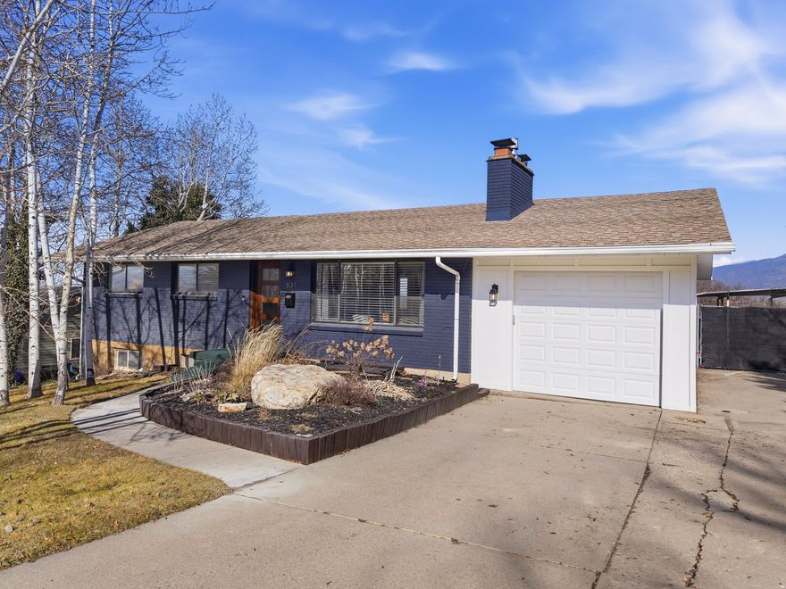 Beautiful RAMBLER in one of East Bountiful's most desirable neighborhoods. NOT a flip. This 5-bed, 3-bath home features a generous size open concept kitchen with abundant counter space and functional layout, perfect for everyday living and entertaining. A MASTERFULLY DONE, HIGH END SECOND KITCHEN included in the basement. The separate basement entrance makes for the perfect ACCESSORY DWELLING UNIT FOR EXTRA RENTAL INCOME OR ACCOMMODATING LARGE GROUPS.  THE LARGE CORNER LOT FEATURES GREAT MOUNTAIN VIEWS FROM THE BACK DECK. Near Valley View & Muir Elementary, as well as Mueller Park, trails, and other amenities. A rare find with space, views, and timeless appeal. EXTRA PARKING: RV Parking, large driveway, 1 car garage plus a carport on the side. Fully Fenced. Other highlights: 2 ensuite bathrooms, 2 fireplaces, quartz counters in both kitchens and bathrooms, both gas ranges. FIBER Internet available. Easy to tour. Buyer to verify all info including square footage.