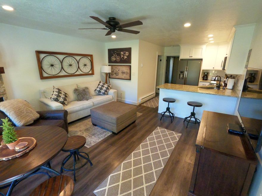 Like new, one unit had the kitchen completely replaced, cabinetry, counter tops lighting, appliances plumbing fixtures, LVP floors, Bathroom replaced and a Washer and dryer built into the Master bedroom closet plus insulation installed in the crawl space for added warmth. Steps from the Pool, clubhouse and Wolf Creek Golf course, a mile from town grocer and Pineview Reservoir. Base of Powder Mountain, close to Snow Basin and Nordic Valley Ski areas. Enjoy pool, lake, hiking, biking, pickle ball and Tennis.  Approved for nightly rentals or year round mountain living.