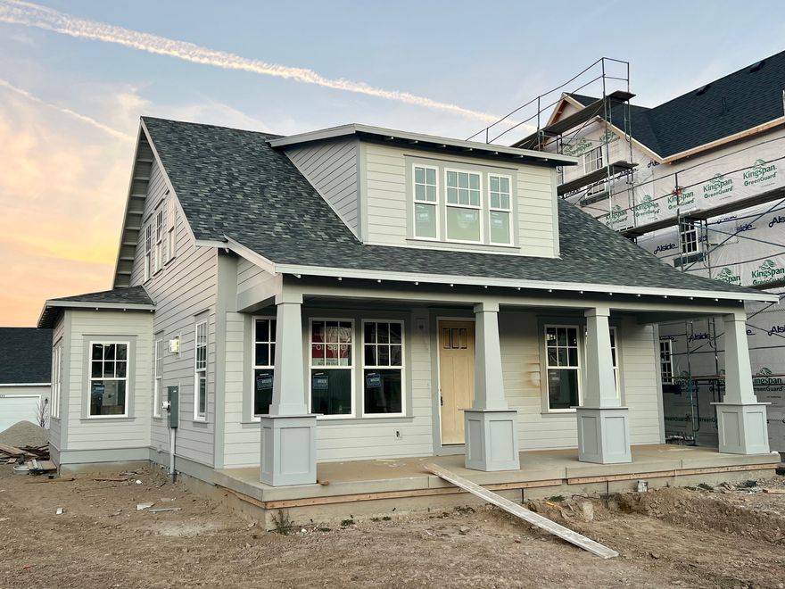 This brand new home is under construction an estimated to be complete January 2026. This home is located on Daybreak coveted Island. One of the last homesites being built. This home features the Primary Bedroom on the main floor with laundry hook ups in the WIC. Fully finished basement w/wet bar, theater room & 10' ceilings!