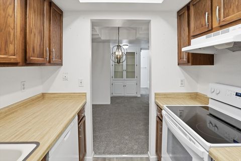 Tiny photo for 6847 S COUNTRYWOODS CIR #18F Cir E, Midvale, UT 84047 (MLS # 2134831)