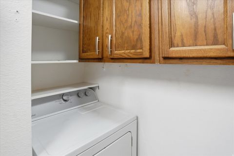 Tiny photo for 6847 S COUNTRYWOODS CIR #18F Cir E, Midvale, UT 84047 (MLS # 2134831)