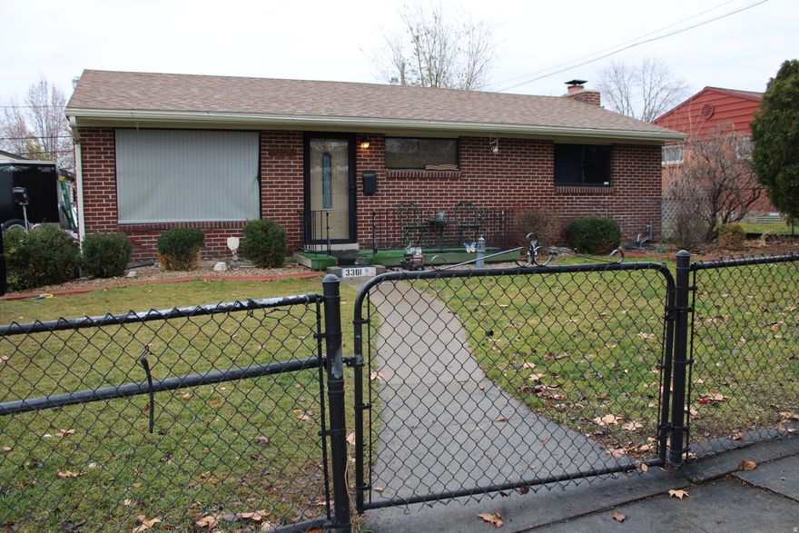 This amazing home is located in one of the best areas of Magna, offering both tranquility and long-term value. According to the MLS history, the roof is approximately 14 years old, and the home features an upgraded energy-efficient furnace. Whether relaxing on the front porch or the Trex back deck, you'll enjoy the serenity of the beautiful yard and the mature shade trees that surround the neighborhood. The upstairs master bedroom could easily be converted back into two bedrooms if needed. The basement includes two bedrooms with potential for a third. The home does need a little TLC and may qualify for FHA financing. You'll love the spacious kitchen, which includes extra room for a semi-formal dining area. Seller is looking for a fast closing! Buyer and buyer's agent to verify all information, including square footage.