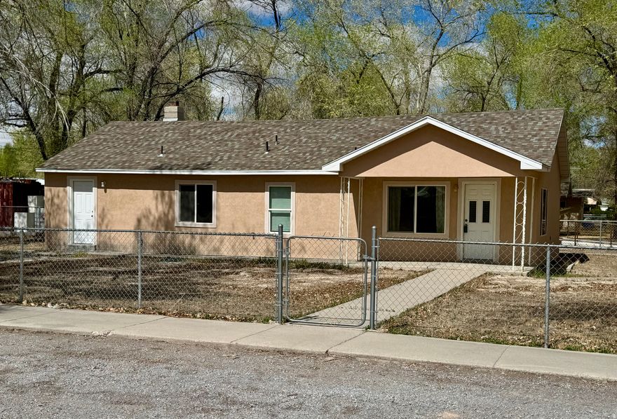 Move-in ready! 3 Bedroom home that has been updated in 2014 with new electrical, plumbing, windows, insulation, flooring, paint, kitchen, bathroom, furnace, stucco & shingles. Single level living. Fully fenced yard with mature trees. Lots of natural light on the main level and a bonus room in the basement for storage. South facing home allows for easier winter upkeep. This would also make a great rental property.