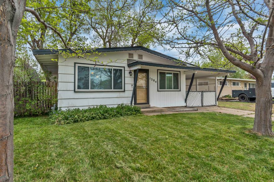 Welcome home to this charming and beautifully updated 3-bedroom, 1-bath gem in Sunset! With 1,083 sq. ft. of thoughtfully designed living space, this home offers the perfect blend of comfort, efficiency, and convenience. Step inside to find original hardwood flooring flowing throughout, adding warmth and character. The open kitchen is perfect for both everyday living and entertaining, featuring a spacious island and a dedicated formal dining area. The home has been exceptionally well cared for and is truly move-in ready. Enjoy peace of mind with a newer roof (just 8 years old) and the added benefit of solar panels, keeping the electric bill incredibly low-around $15 per month. The exterior is just as impressive, with RV parking and an electrical hookup, making it ideal for adventurers or those needing extra space. The backyard is a standout feature, offering a huge grassy area and a comfortable patio seating space-perfect for relaxing evenings, gatherings, or summer BBQs. The added jellyfish lighting gives the home a unique and inviting touch year-round. Located in a prime commuter-friendly area, this home provides quick and easy access to I-15 and Hill Air Force Base, making daily travel a breeze. Clean, updated, and full of charm-this is one you won't want to miss!