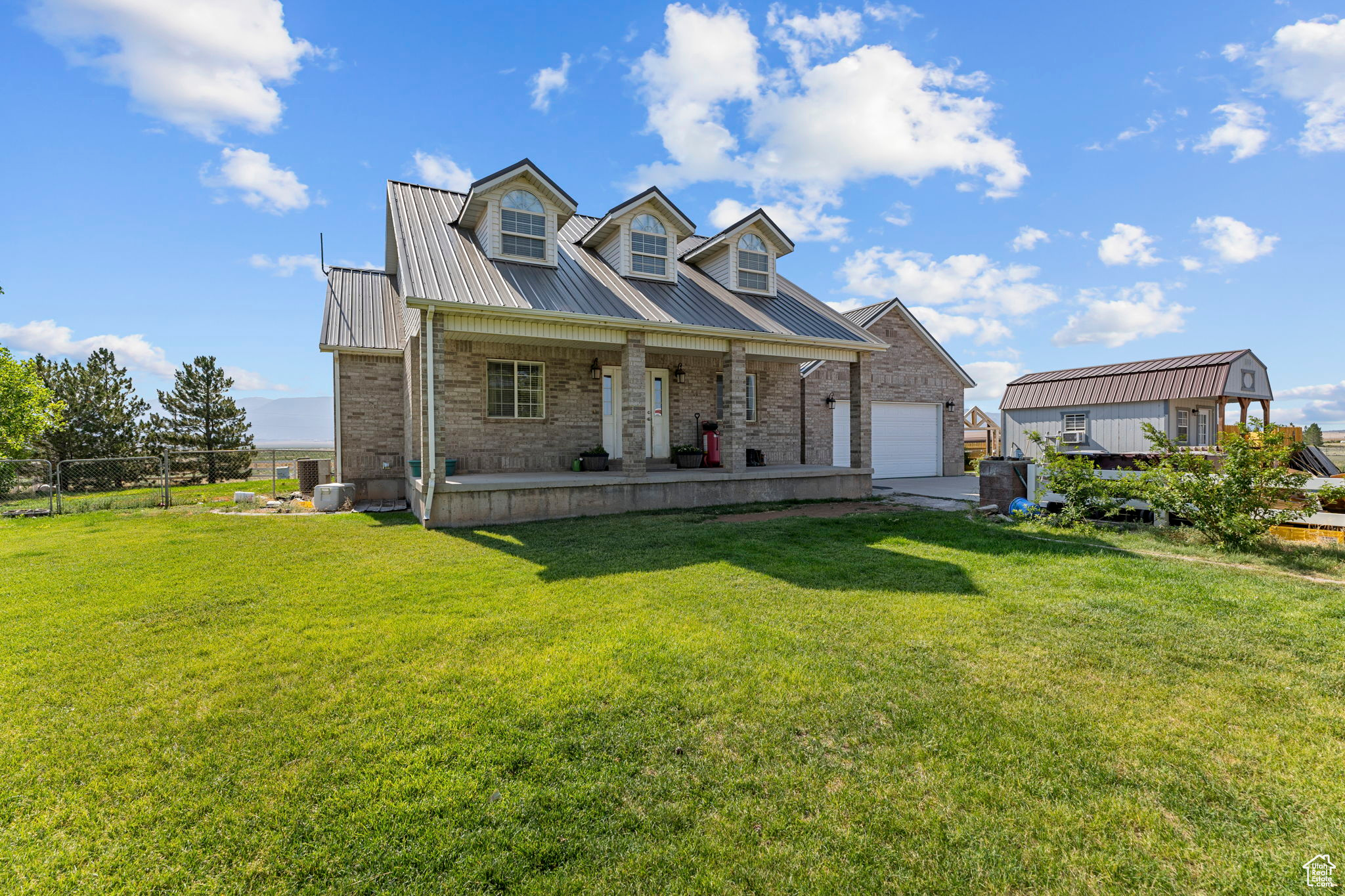 Rare opportunity on 8+ acres in Cedar City! This 5 bed, 4 bath, 3,428 sq ft home includes 2 water shares, a vegetable-producing garden, and space for sheep, a bull, horse, chickens, turkeys, and more. A large barn offers storage or livestock shelter. The property is fenced with an additional fully fenced yard behind the home. Perfect for homesteading or hobby farming with stunning views and room to grow-all just minutes from town!