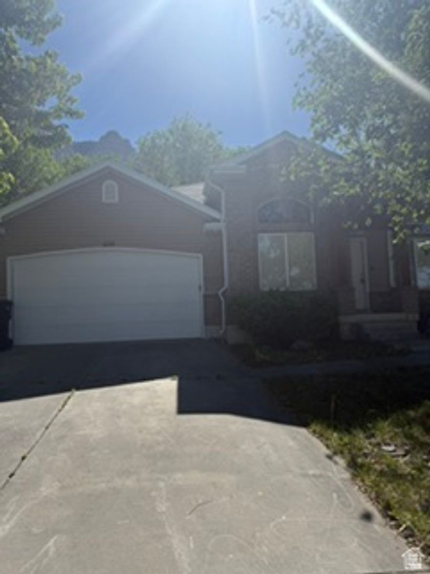 Recently updated home in a great area of willard. This home has breath taking views  vaulted ceilings through the home and a very open spacious layout for large gattherings. This is a must see come in Willard. Buyer to verify all info.