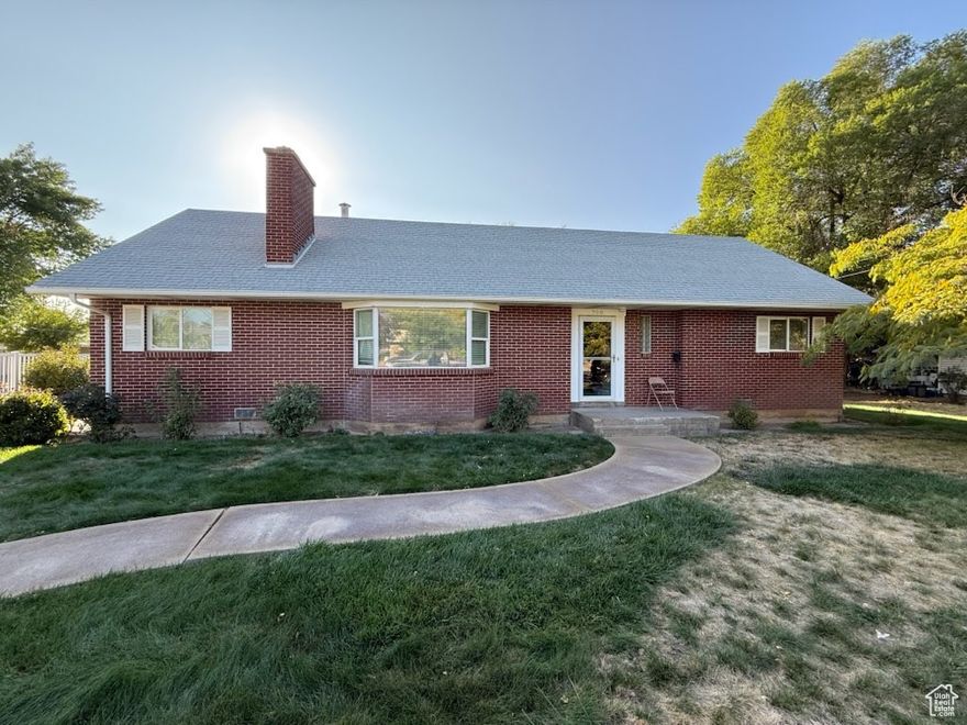 Charming one-owner home in the heart of Spanish Fork!  4 bedrooms, 2 baths, and over 2,300 sq ft of space on a generous .37-acre lot. Mature trees provide shade and character, while the detached garage adds functionality. Built in 1961, this home is ready for your personal touch and updates to make it shine. Conveniently located near schools, parks, and all the amenities of Spanish Fork. A great opportunity to create the home you've been looking for!