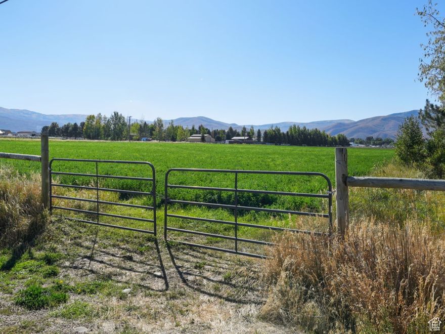 Four beautiful flat greenbelt parcels being sold together totalling 13.99 acres.  360 degree views of Timpanogos, the Wasatch mountains and surrounding hills.  Sale includes sufficient primary shares of Timpanogos Irrigation Co water for 3 acre feet per acre.  Additional shares can be negotiated.  Land can remain in agricultural status, be developed and split into smaller lots of 1 acre or more or put a house on one lot and grow hay on the rest!  Bring your horses and livestock - see county rules for quantity and varieties.  The parcels are not lots of record yet but here are the parcel numbers:  00-0009-2820, 00-0014-3417, 00-0009-2812 and 00-0009-2804.  Come see what Heber has to offer: clean air, 14 min to Deer Valley East Village ski resort with 6 more lifts and 100 more runs opening this winter, 25 min to Park City and Provo, 45 to SLC airport, and abundant year-round outdoor activities including 108 championship holes of golf (more to come!), blue-ribbon fishing, hiking, biking, skiing, and snowmobiling. This is your place!