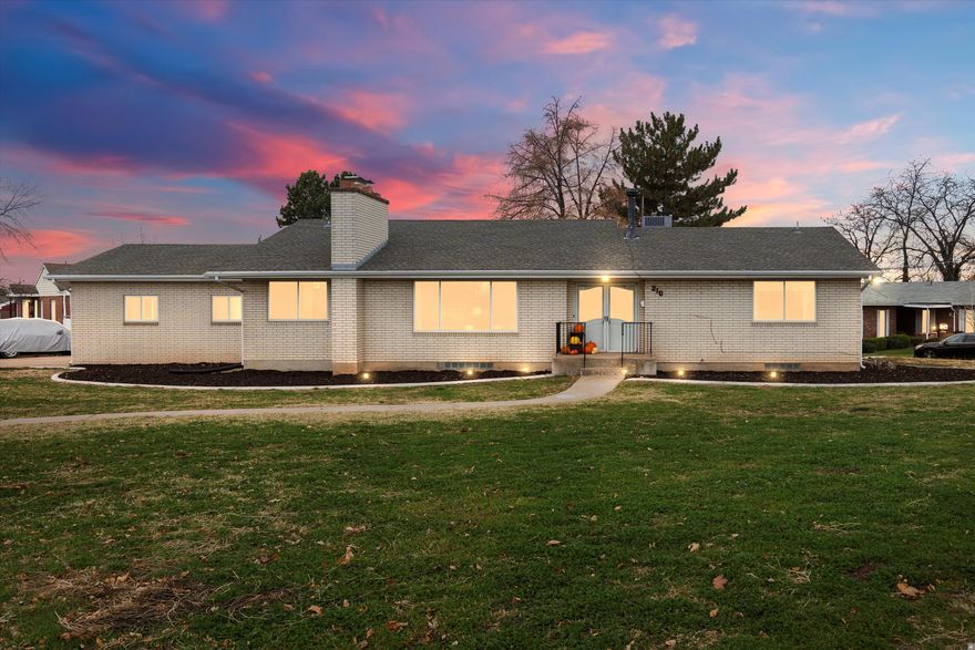 Don't miss this one-of-a-kind brick rambler on a large 1/3-acre corner lot. With over 3,200 sq. ft. of living space, this home features 5 bedrooms, 3 bathrooms, and a spacious open floor plan filled with natural light. Enjoy two family rooms, and big covered patio, ideal for entertaining, along with the option of main-level living, if desired. The separate entrance and second kitchen in the basement offer great flexibility for multigenerational living or potential rental income. Recent improvements include a new A/C unit, water heater, and sprinkler system. Located in a quiet Clearfield neighborhood close to schools, parks, the rec center, and Hill Air Force Base, this home provides both convenience and comfort in a fantastic location.