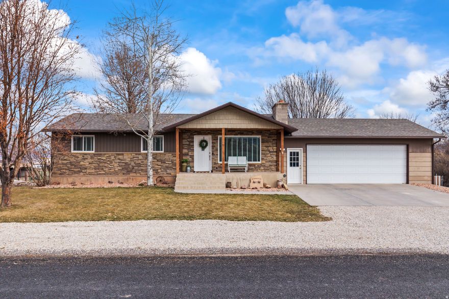 This beautifully updated home offers spacious living with 5 bedrooms and 3 bathrooms. Enjoy a covered deck with hard to find mature trees, vegetable garden, fruit trees, RV parking, and more! This home has tons of storage and a basement entrance. This property is well cared for and has two furnaces, two a/c units, and two fireplaces. A great find with all the must-haves! Owner/Agent