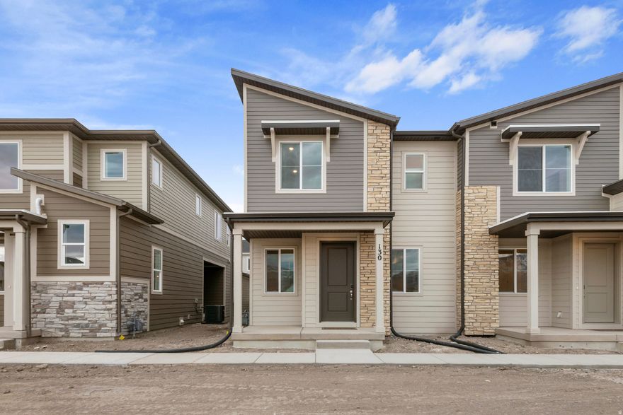 0% Down-Payment Options Available. Contact Sales Associate for More Information *** The Chicago plan greets guests with a charming, covered porch and continues to impress with an open kitchen featuring a pantry, center island and adjacent dining room. The main floor also offers a powder room, an inviting living room, a covered patio with center-meet sliding glass doors, and a 2-car garage. Upstairs you'll find a convenient laundry and three generous bedrooms, including a primary suite with a walk-in closet and private bath. Designer curated finishes complete this semi-luxury home with quartz countertops throughout home and LVP flooring on main areas. Current pictures are from a model home and are not exact representations of the home's interior and exterior design. Buyer to verify square footage