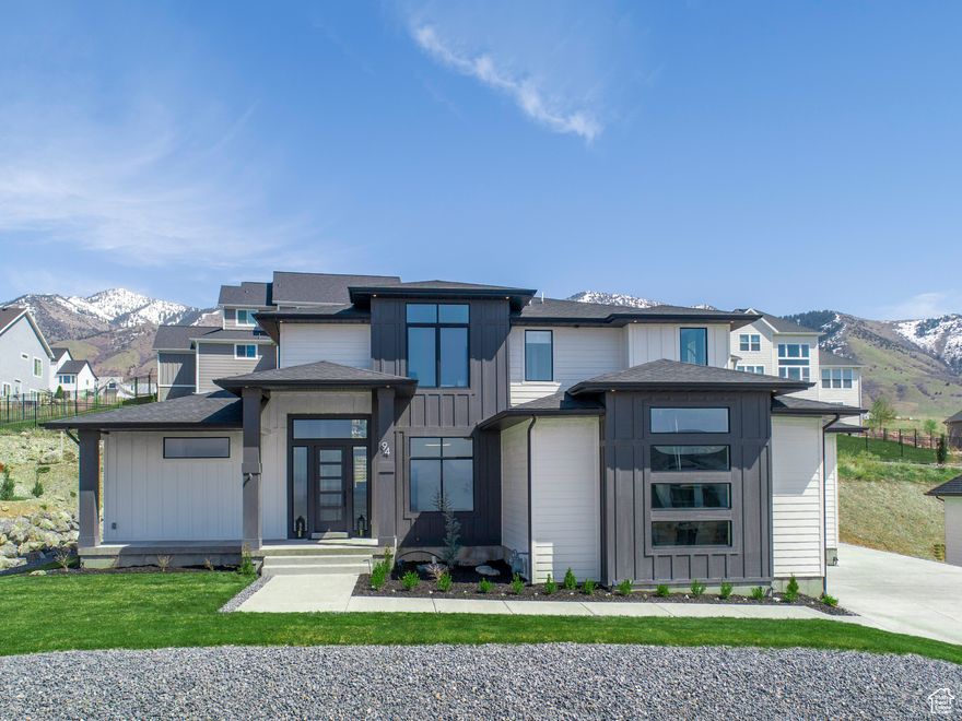 Step into timeless sophistication and effortless luxury with this immaculate residence. Placed in a serene, upscale neighborhood, this stunning home offers the perfect blend of modern design and refined comfort. From the moment you enter, you're greeted by soaring ceilings, flawless hardwood floors, and an abundance of natural light that pours through oversized windows, illuminating every exquisite detail.  The gourmet kitchen is a chef's dream-featuring state-of-the-art appliances, gleaming stone countertops, and custom cabinetry that speaks to the home's impeccable craftsmanship. Flowing seamlessly into the spacious living and dining areas, it's an entertainer's paradise designed for both grand gatherings and cozy nights in.  Outside, enjoy a beautifully landscaped backyard oasis-perfect for alfresco dining, relaxing under the stars, or simply soaking up the sun in total privacy.  This is more than just a home-it's a lifestyle. Welcome to pristine luxury, where every detail has been curated for comfort, beauty, and ease. ASK about the MANY loan options available including MEDICAL professional loans for 100% financing!! Landscaping credit is available to finish backyard if desired - call with questions.