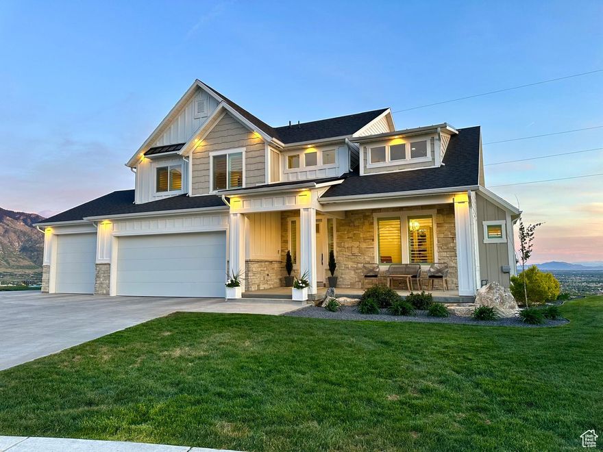 Welcome to this stunning modern farmhouse, perfectly situated on a 0.48-acre lot with sweeping views of both the moutains and the city skyline. Spanning nearly 5000 square feet, this 7-bedroom, 3.5-bathroom home combines luxury, functionality, and breathtaking scenery in every direction. Step inside to find a stylish three-tone paint, spacious living areas and oversized walk-in closets in every bedroom. The primary suite offers a true retreat with a spa-inspired bathroom featuring a built-in makeup vanity, freestanding tub, double shower heads and a walking-in shower. Designed for comfortable and convenient living, this home features dual heating and cooling units, two large storage rooms, a laundry chute, and gas/electric laundry hookups on the main floor and in the basement. The finished basement includes a full mother-in-law apartment with full-size appliances, two exit doors for seamless entertaining and its own dedicated outdoor space. Outdoor living is a dream here, with three separate porch areas ideal for relaxing or hosting, a built-in gas grill hookup and an underground trampoline for family fun. The 3-car garage offers ample space, with touches like roller shades on the back of the home and elegant shutters in the front, which elevate the home's curb appeal. Don't miss this rare opportunity to own a custom modern farmhouse that blends comfort, elegance and spectacular panoramic views. Square footage figures are provided as a courtesy estimate only and were obtained from county tax data. Buyer is advised to obtain an independent measurement.
