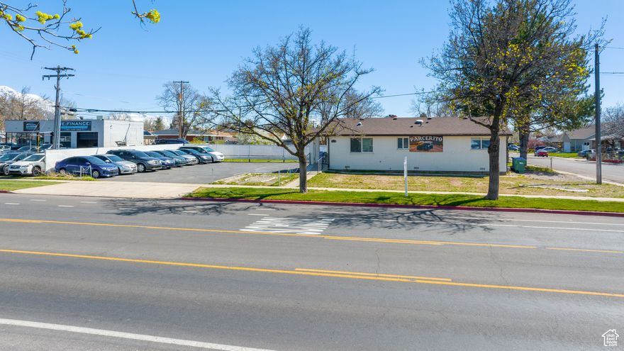 Recently remodeled brick office building, ZONED C2 which allows for many potential uses. Currently being used as an AUTO DEALERSHIP, and was previously used as a spa/beauty salon.  Good investment opportunity renting for $3,800/mo with tenant paying the utilities! The current tenant would love to stay but could vacate if desired. Ample parking, high visibility, and quick freeway access!  This is a great place for your small business.