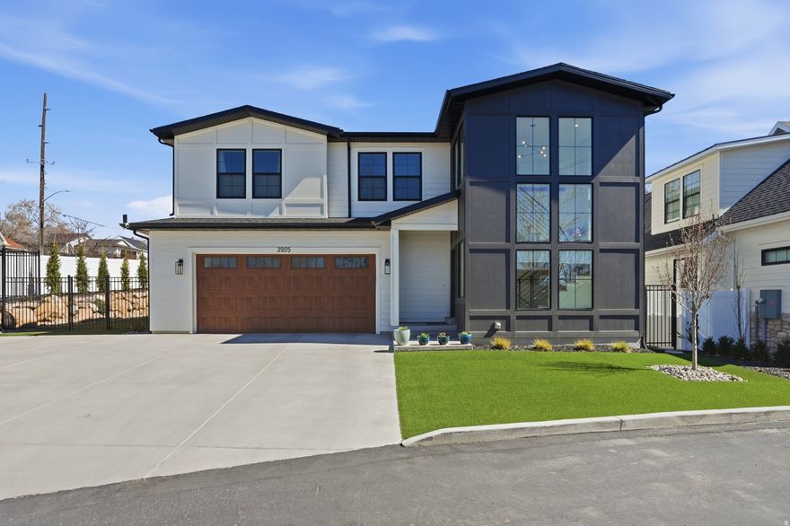 Nestled in a prestigious private subdivision in Holladay, this home is better than new with thoughtful upgrades inside and out. Enjoy a fully fenced backyard with high-end artificial turf (no more muddy paws!), planter boxes, and an extended concrete pad with hot tub electrical ready for relaxing evenings. The yard  includes a shed, easy access dog door, and expanded driveway parking for two additional cars. Inside, you'll find upgrades throughout such as custom blinds, smart locks, a whole-home surge protector, garage organizers along with updated high-end lighting and gorgeous granite island. The basement is built for entertaining with a wet bar fridge, added lighting, and built-in wall and ceiling stereo speakers in the living area. Additional highlights include bidets in two bathrooms, & convenient ethernet wiring throughout.  This home has the setup perfect for modern low-maintenance  living with easy freeway access to downtown and year-round canyon recreation.  Buyer to verify all info.